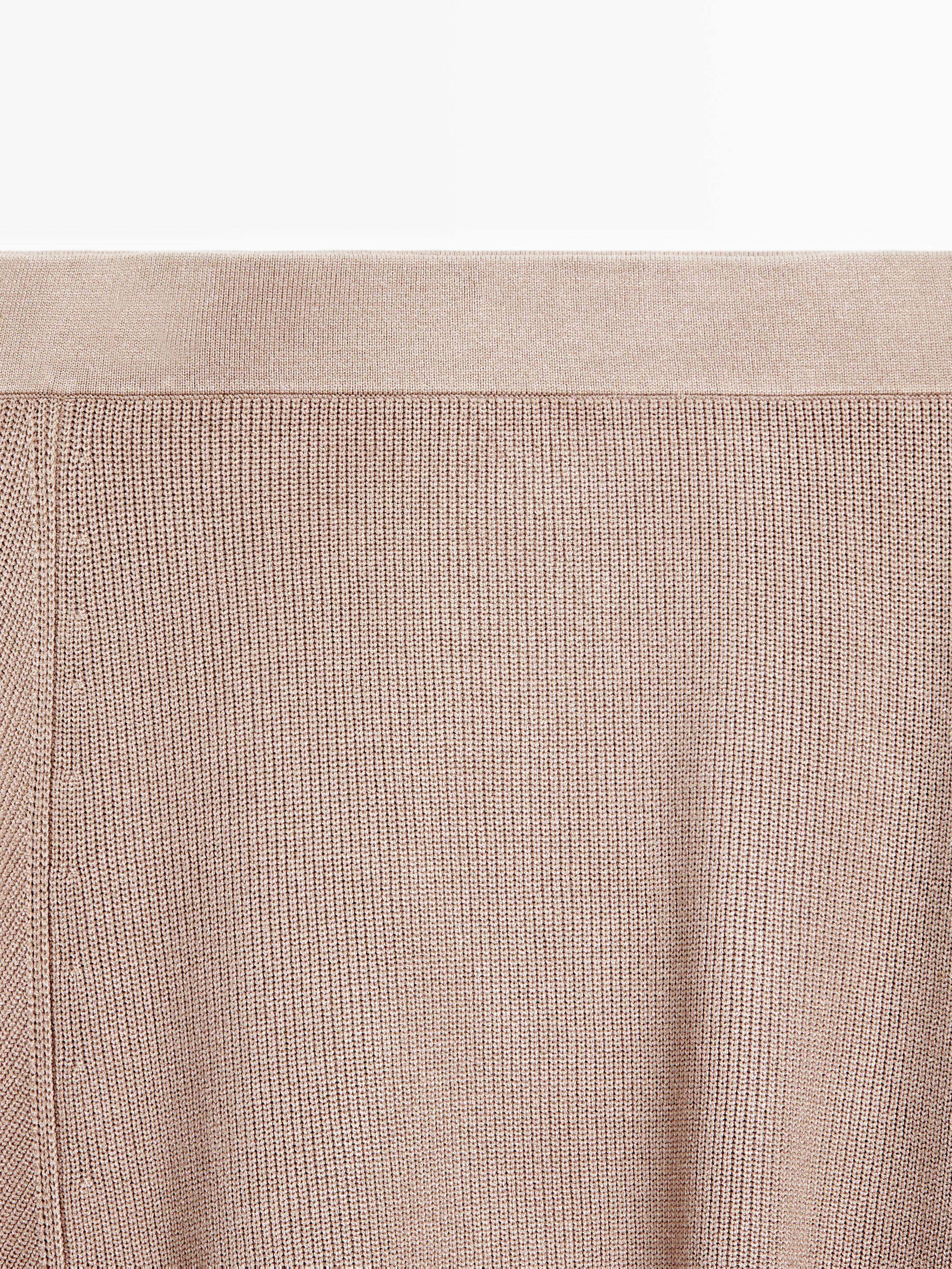 Asymmetric knit midi skirt